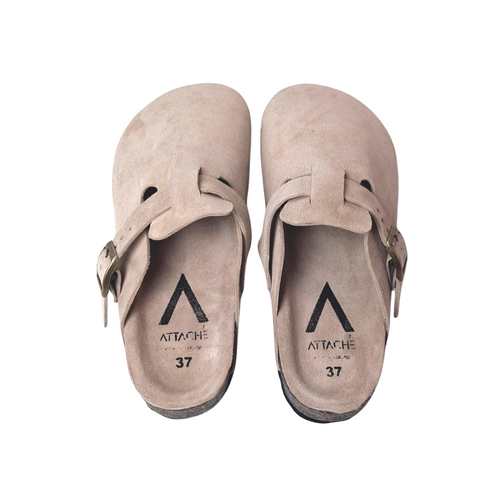 Attache Bags nude suede leather clogs with adjustable brass buckles and cushioned footbeds, top-down view.