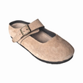 Attache Bags nude suede leather Merry Jane clogs with an adjustable buckle strap and a rounded toe profile.